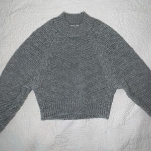 Size ca cropped sweater.